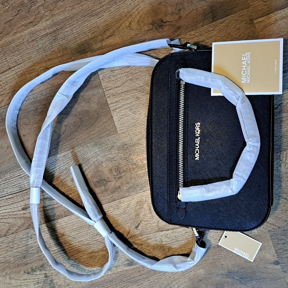 Michael Kors Jet Set Travel crossbody bag in black/silver. New with tags